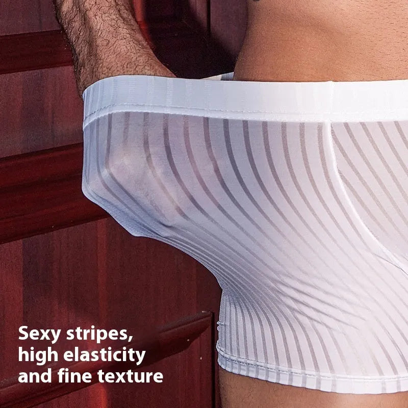 Men's black and white striped nylon boxer briefs laid flat, showing free size elastic waistband.