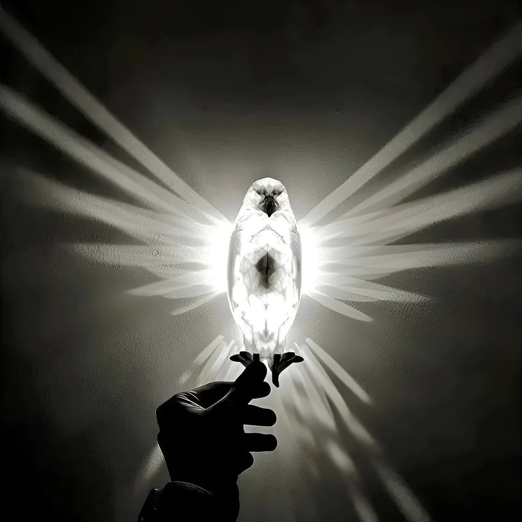3D printed plastic eagle wall lamp projecting animal silhouette for home decor.