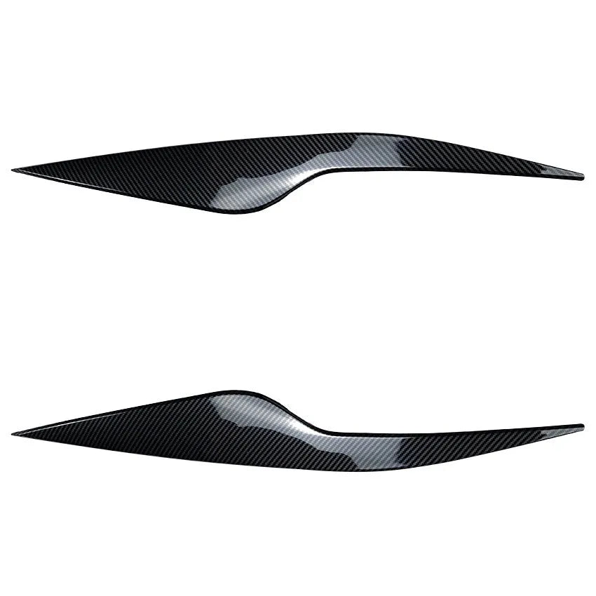 Pair of ABS plastic headlight eyebrow stickers for Ford Focus in carbon fibre pattern and piano black finish
