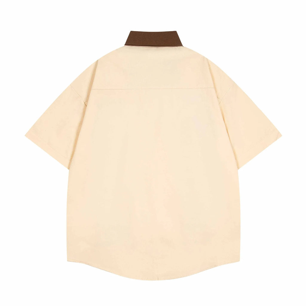Baby boy and girl summer loose top in apricot with cartoon pattern, front view