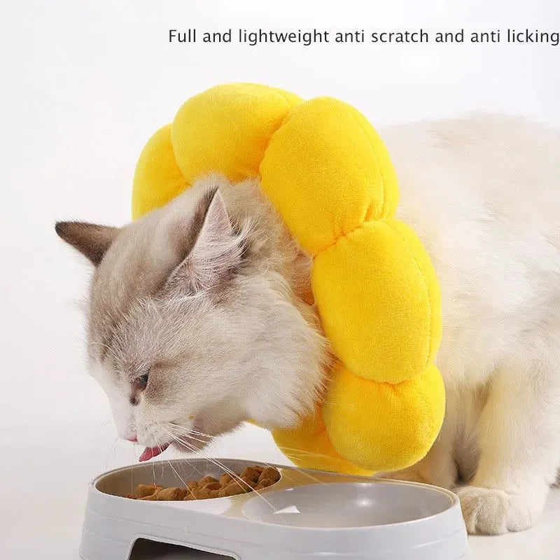 Soft white cotton pet protective collar for cats and dogs on a table, showing adjustable band and inner ring.