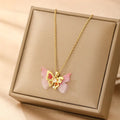 Women's copper necklace showing four pendant options: heart, round diamond, butterfly and cross designs