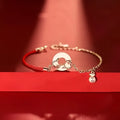 Women's festive koi design bracelet with a peace buckle and red rope, Japanese Korean style.