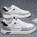 Men's low-top canvas board shoes in black, beige, or grey with round toe and leather stitching.