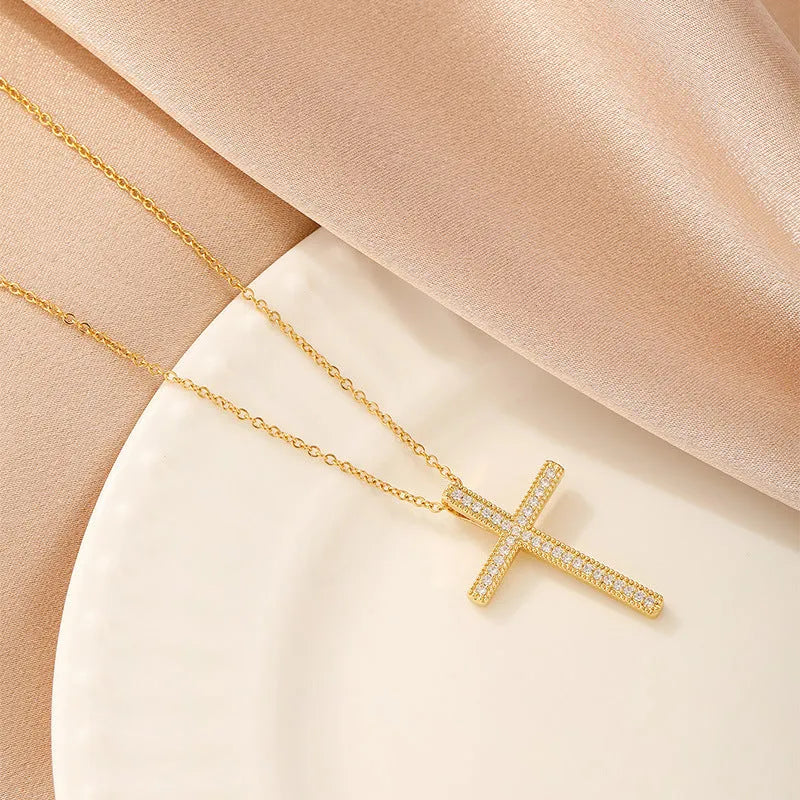 Women's copper necklace showing four pendant options: heart, round diamond, butterfly and cross designs
