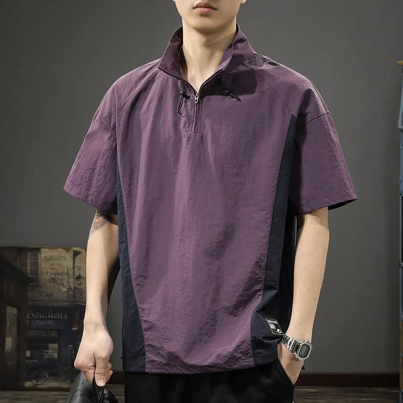 Man wearing a brown half-zip stand collar casual shirt made from ice silk fabric.