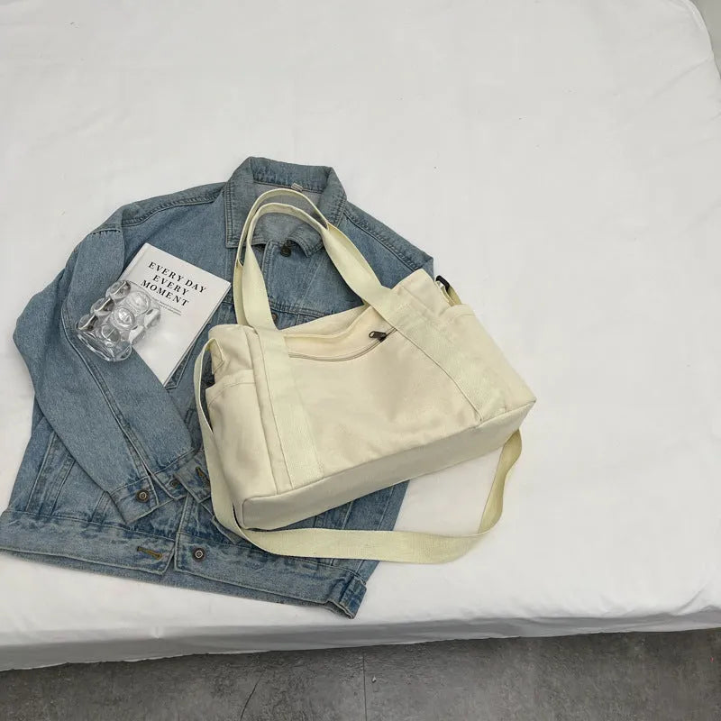 Large capacity polyester canvas shoulder tote bag with external pocket and phone compartment