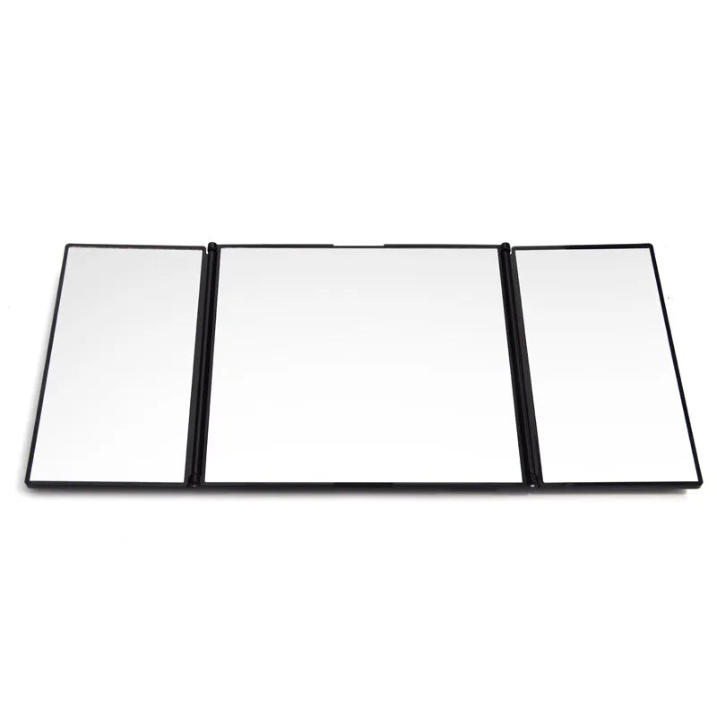 Silver portable folding car mirror shown both closed and open to double its length.