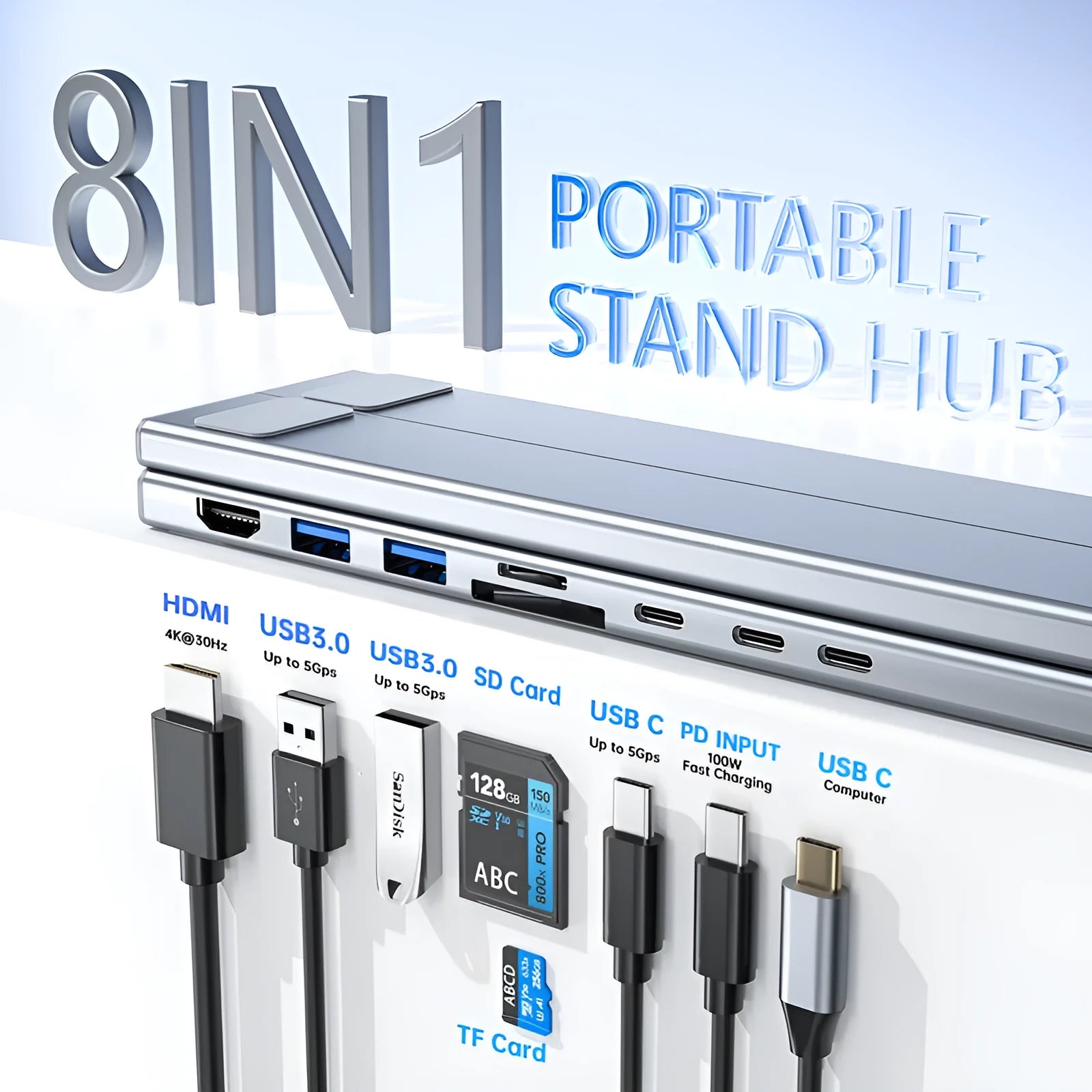 Aluminium folding laptop stand with built-in multi-port docking hub on a desk.