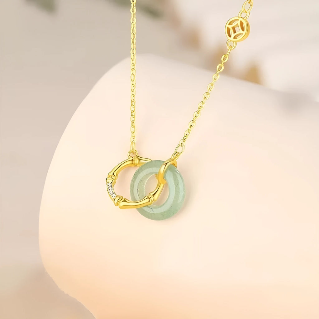 Sterling silver bamboo joint peace buckle necklace with adjustable chain and pearl accents