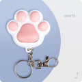 Pink and black infrared cat teaser toy with key chain measuring 5cm by 2.5cm