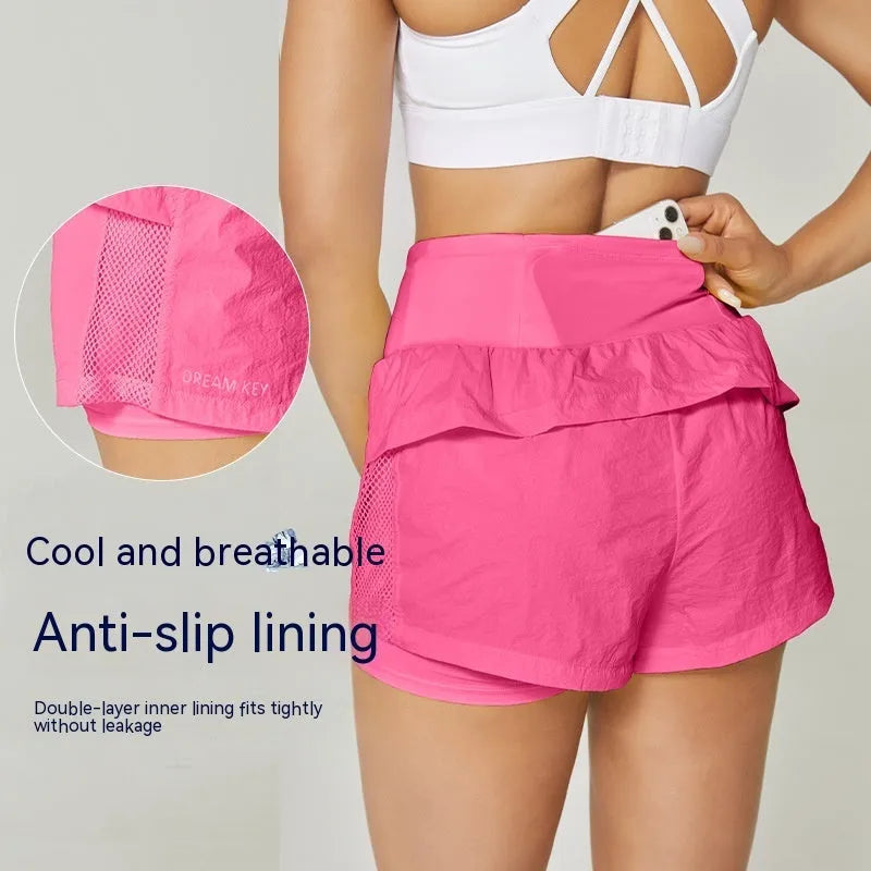 Women's loose fit cotton blend quick-drying sports shorts shown in available colours on size chart