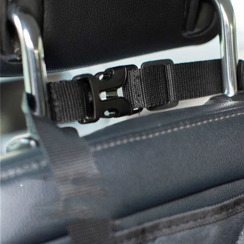 Black polyester two-seater car rear pet mat, waterproof and scratch-resistant, laid across a car seat