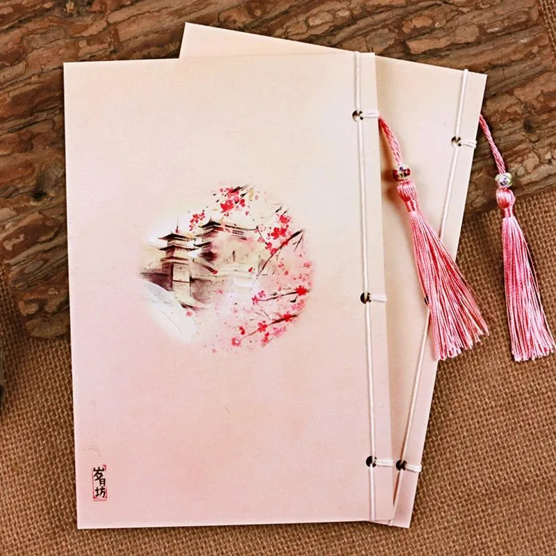 Azalea coloured Chinese style notebook with thread binding, showing its 208mm by 140mm size.