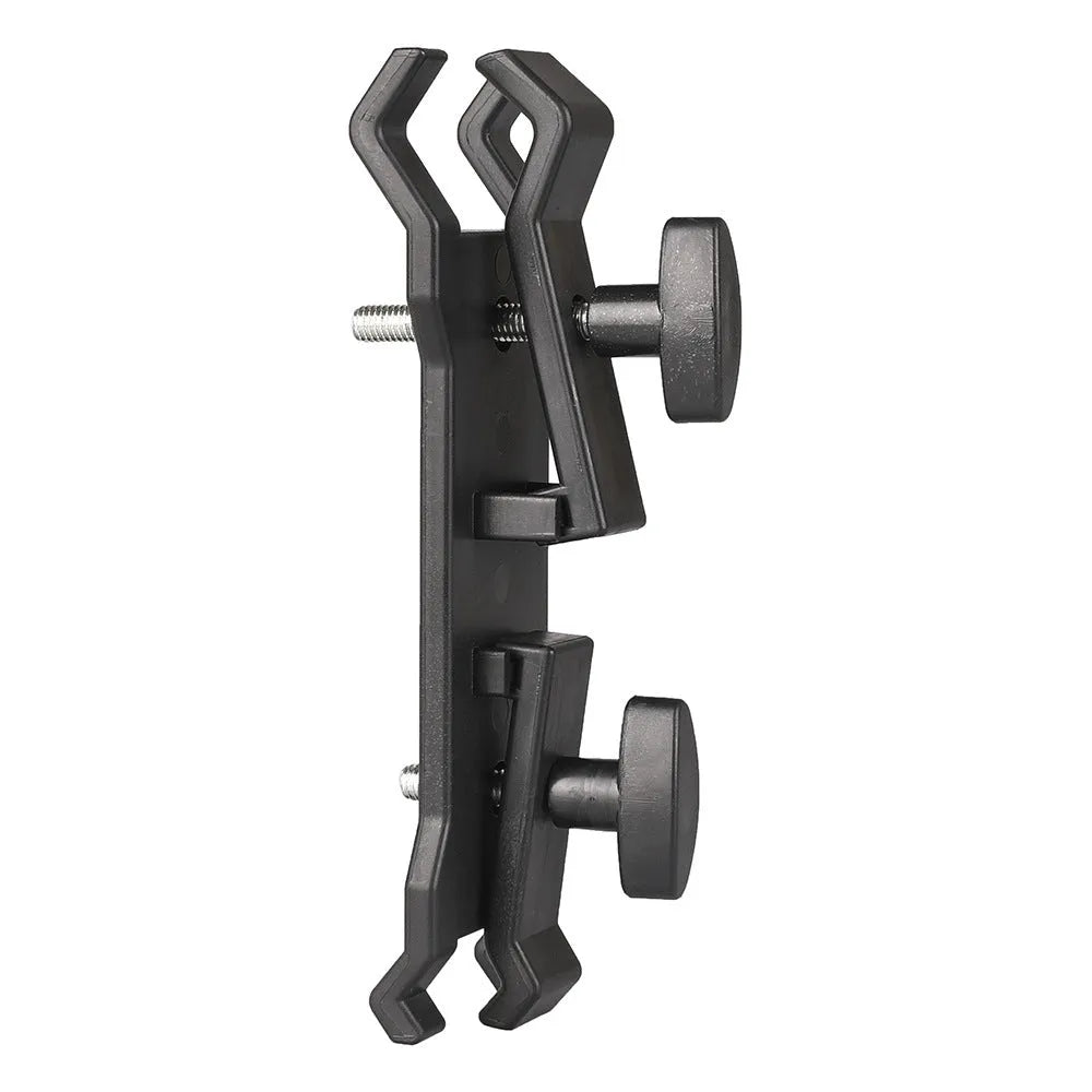 Black ABS plastic umbrella clip attached to an Apple tripod for camera rain protection.
