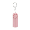 Compact pink girls personal safety alarm with keyring, dimensions 86x30x20mm.