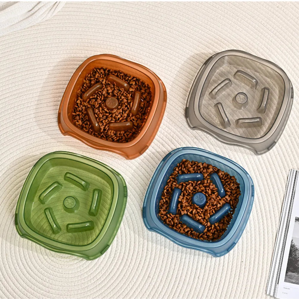 A blue plastic slow feeder dog bowl with a low 4cm profile to prevent fast eating.