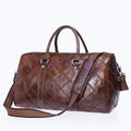 Vintage brown leather men's duffel bag with a single shoulder strap, shown open to reveal internal phone and ID pockets.