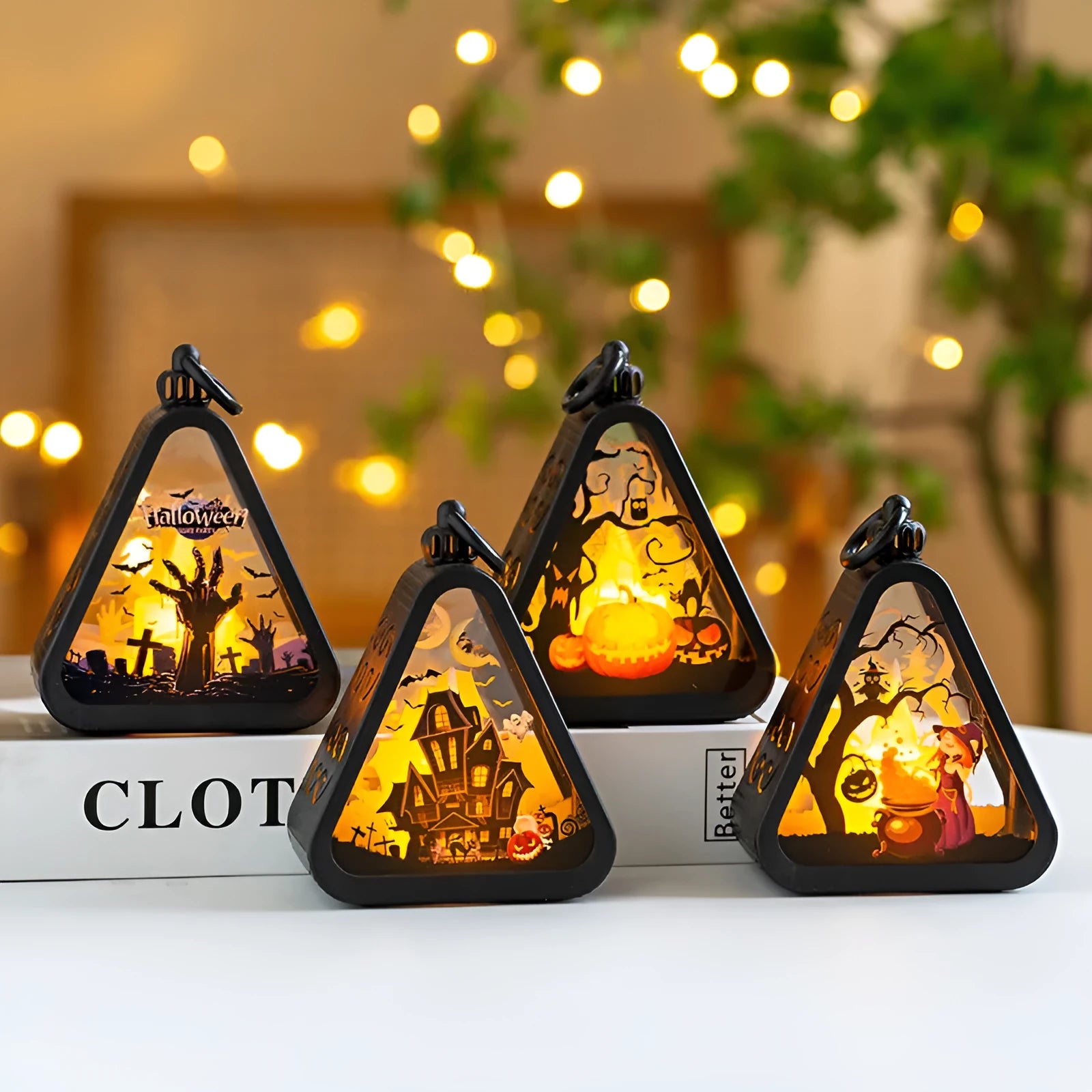 Portable Halloween pumpkin lamp decoration in pumpkin colour on a table