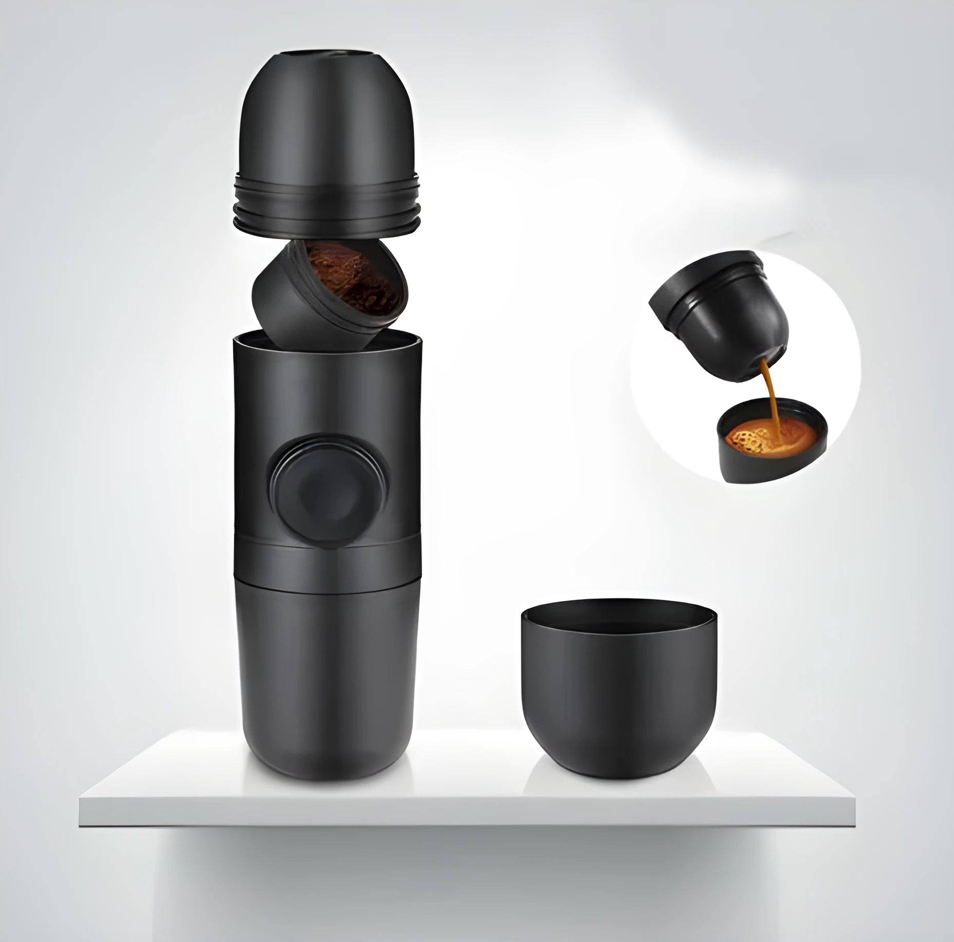 Black portable manual coffee machine showing compact 6cm design with pressure system for travel brewing