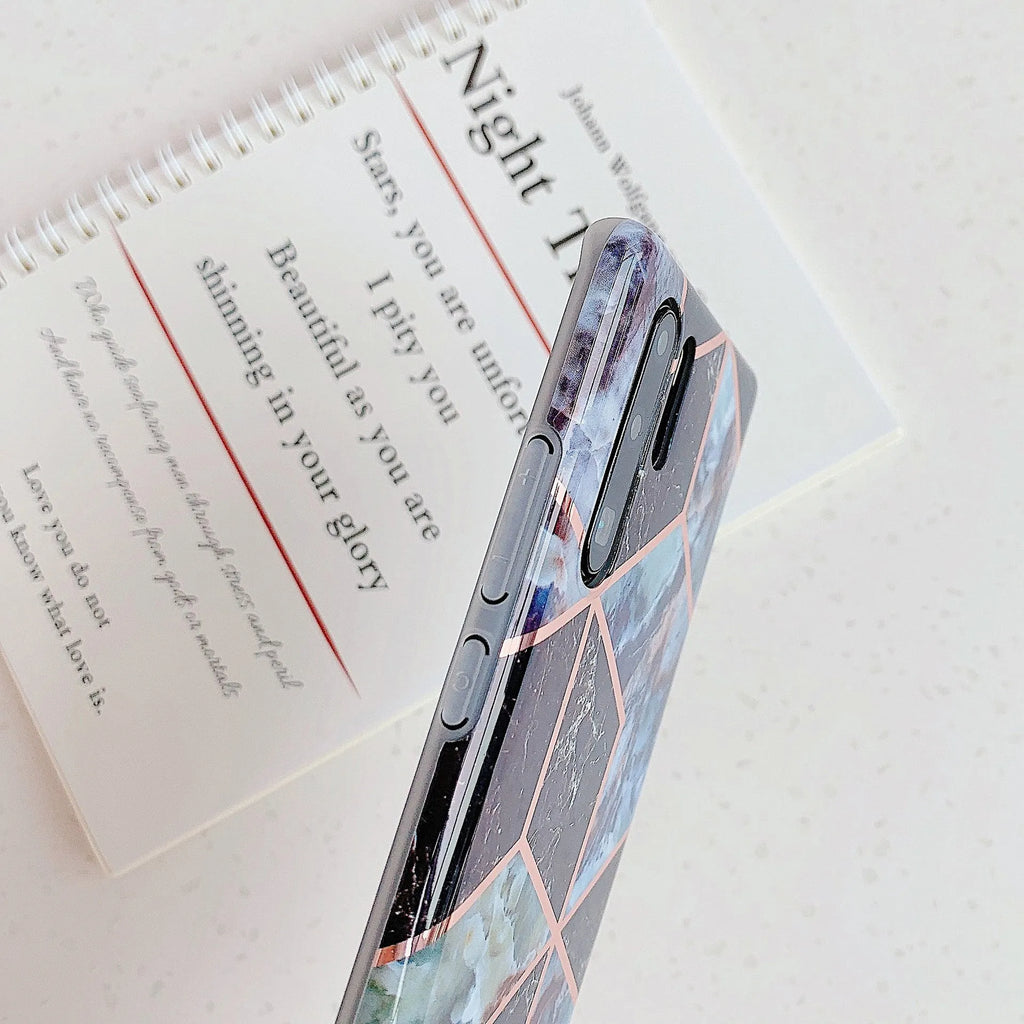 Electroplated marble pattern TPU back cover case for a mobile phone.