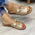 Ladies casual sandals with fish mouth design and bow decoration in black, pink, and gold colours.