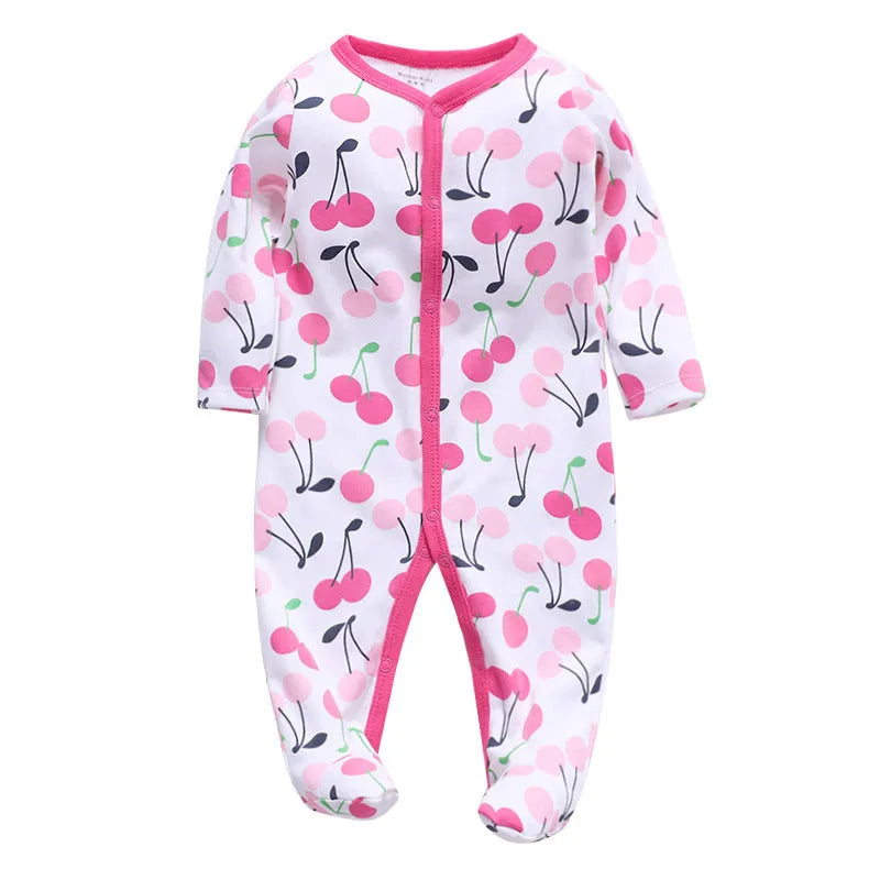 Cotton baby one-piece romper with dinosaur print in blue, sized for 6-month infants.