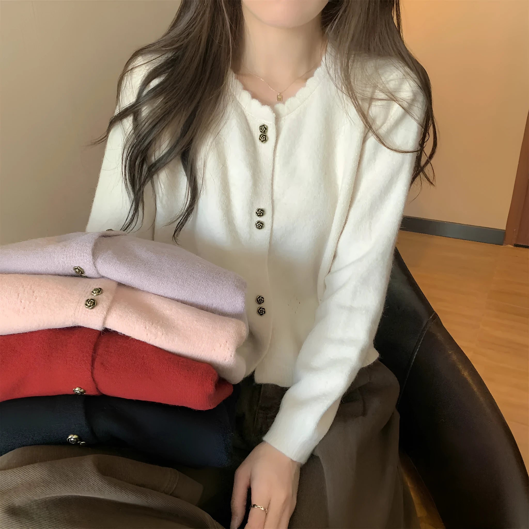 Women's long-sleeved acrylic cardigan sweater coat in free size, shown in a light colour.