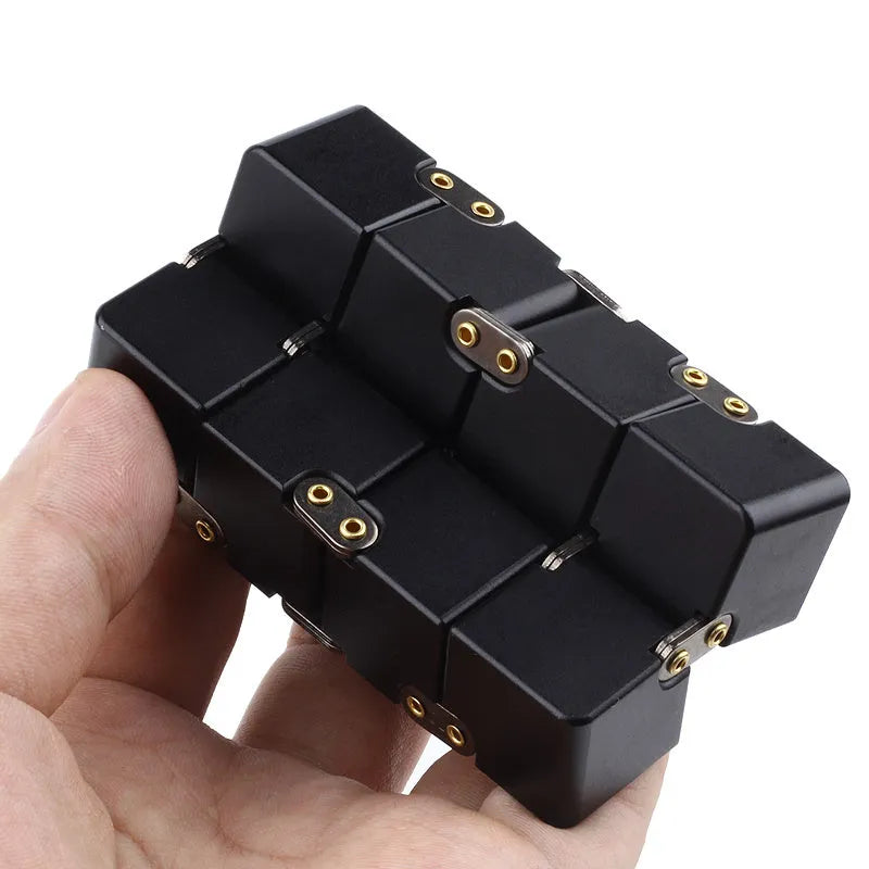 Zinc alloy infinity cube fidget toy showing rotating black cubes in 4cm metal construction
