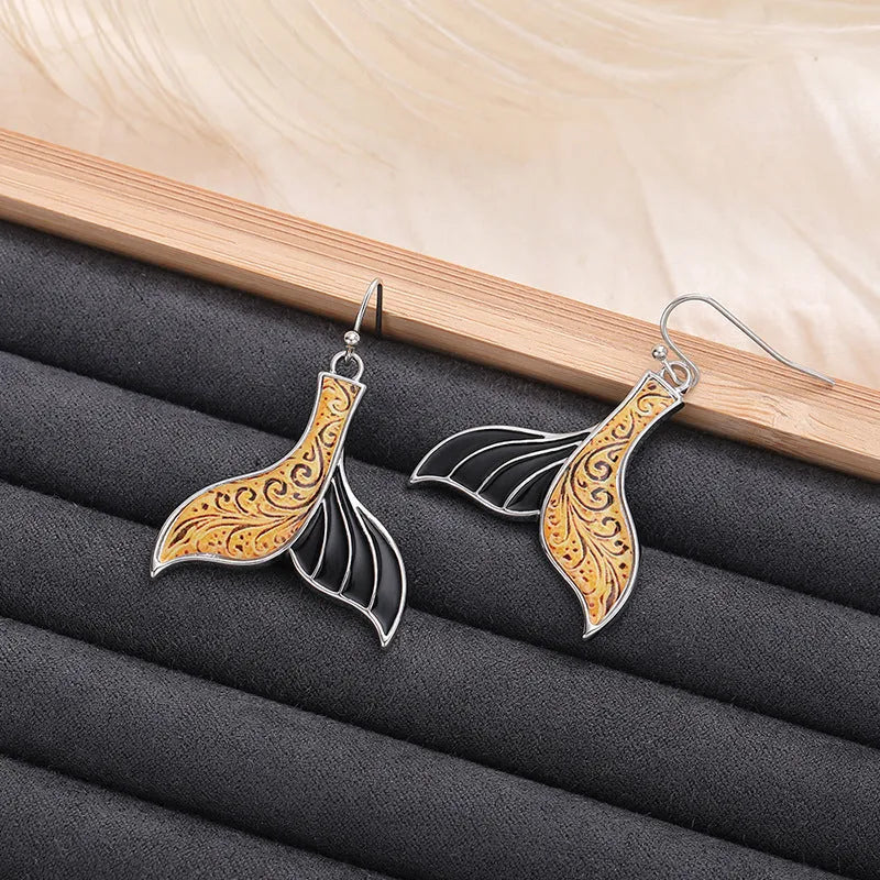 Women's retro fish tail earrings with whale design in white gold colour alloy