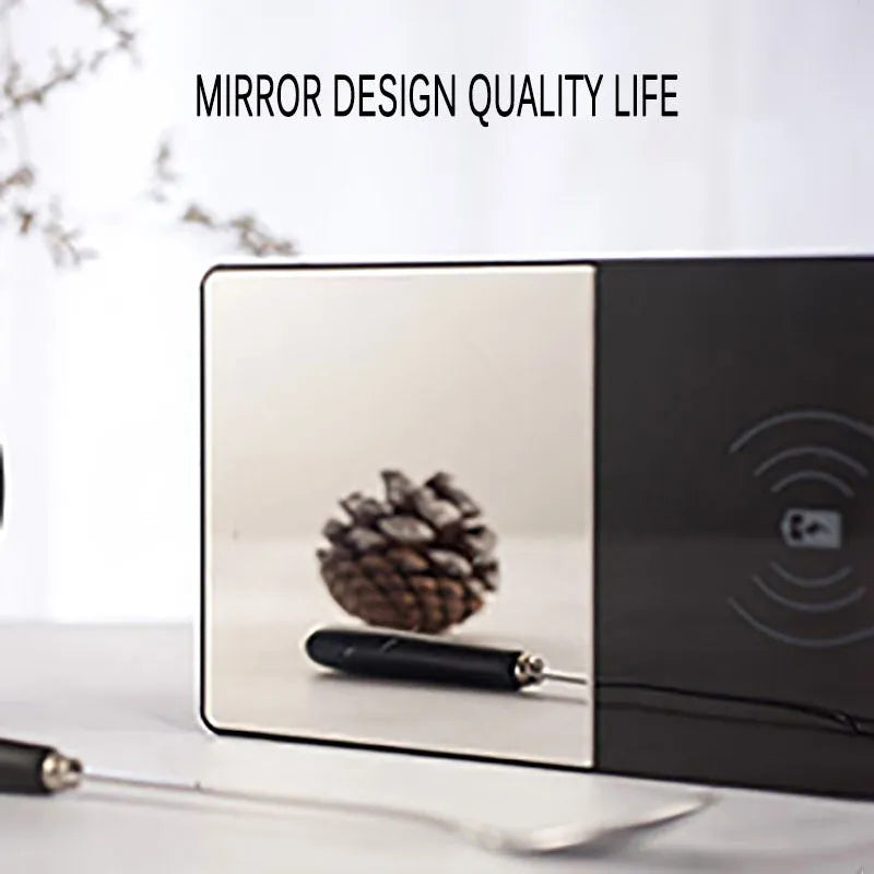 2-in-1 heating mug cup warmer with wireless charger on a desk with a glass mug