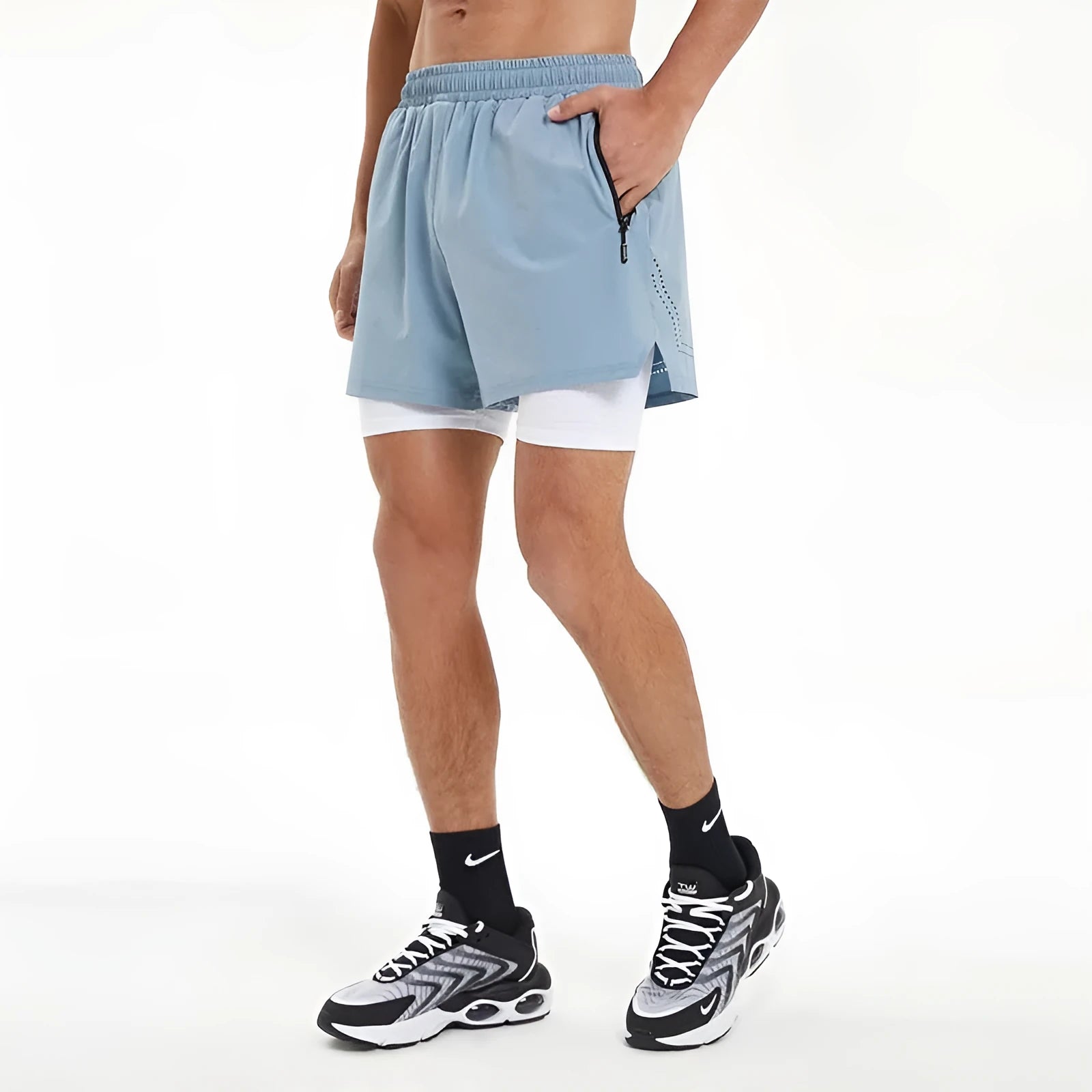 Men's black double-layer running shorts with built-in liner shown on model