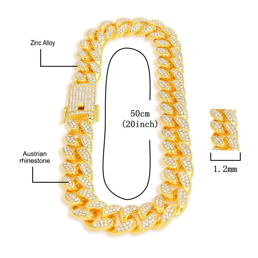 Roman numeral quartz watch with black mesh band, matching bracelet and necklace set in gold tone