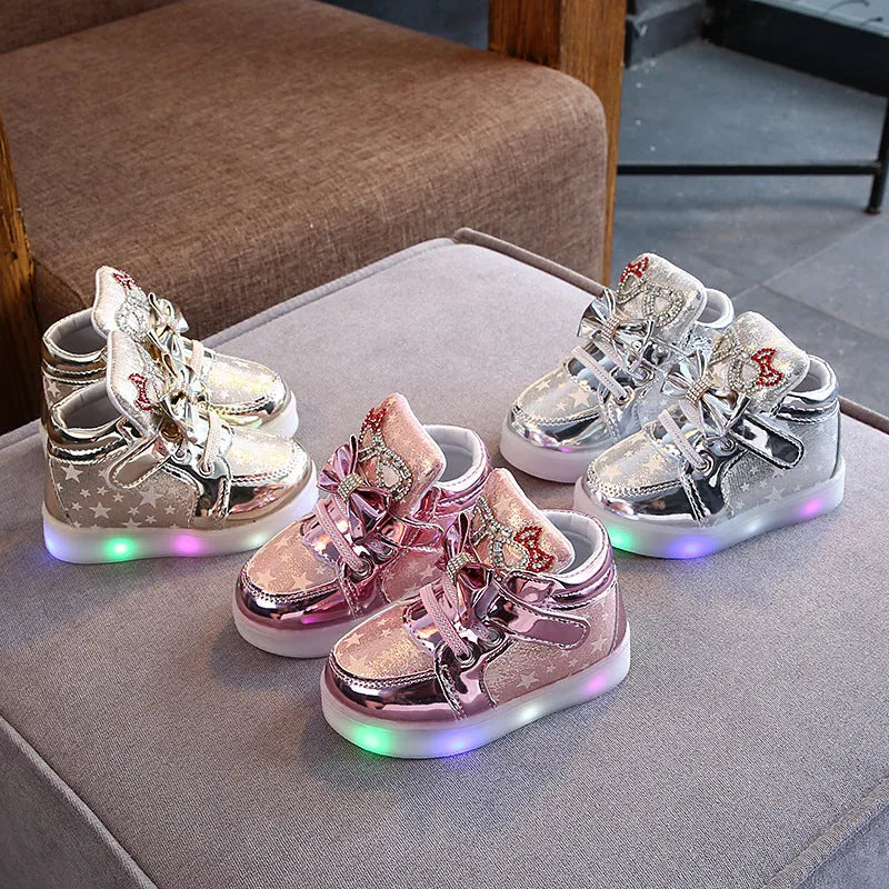LED children's trainers with magic button switch showing colour changing lights and flashing heel illumination