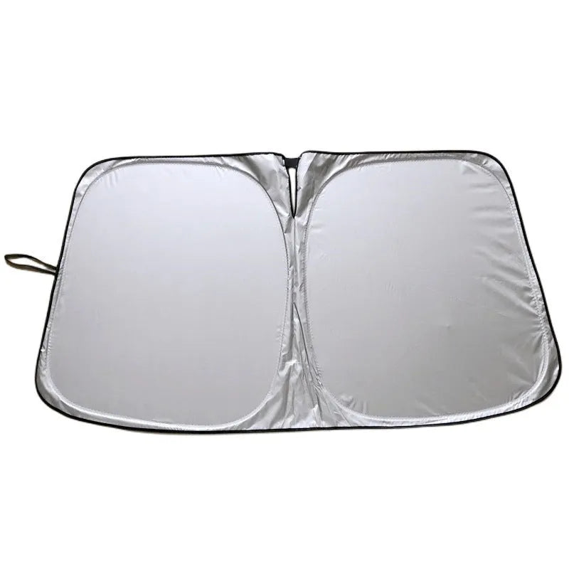 Aluminium foil car sunshade showing titanium silver colour, folded concertina-style.