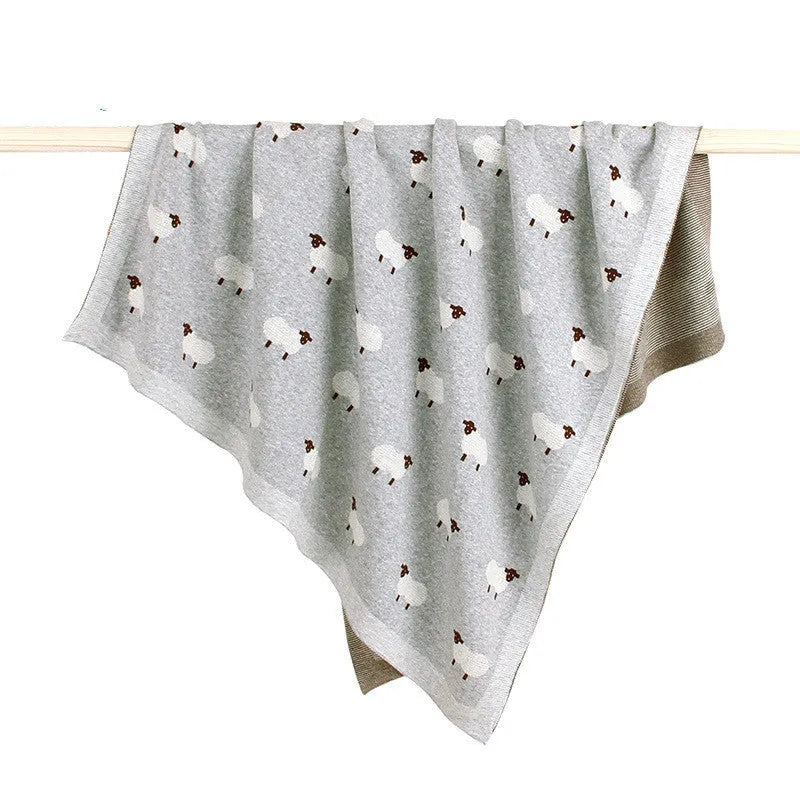Grey and pink 100x80 cm baby sheepskin blanket made from 100% cotton fabric for cot and pram use.