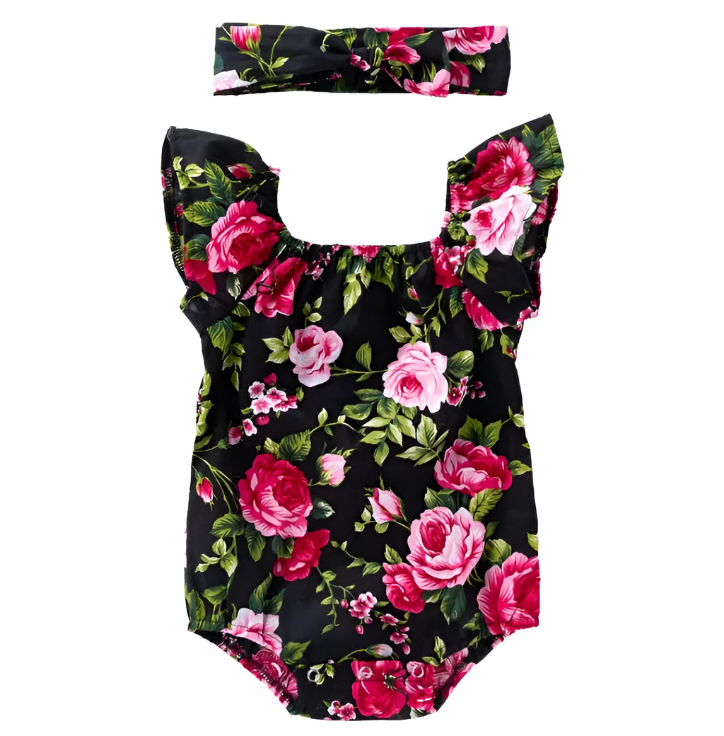 Baby girl wearing black cotton sleeveless romper with triangle climbing style