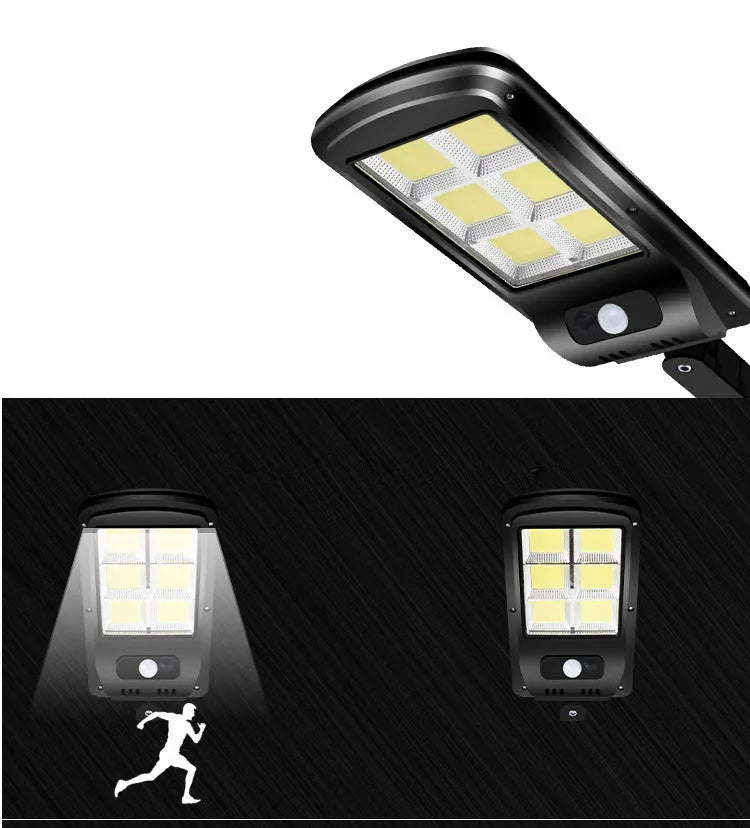 Black outdoor solar-powered security light with motion sensor on a wall.