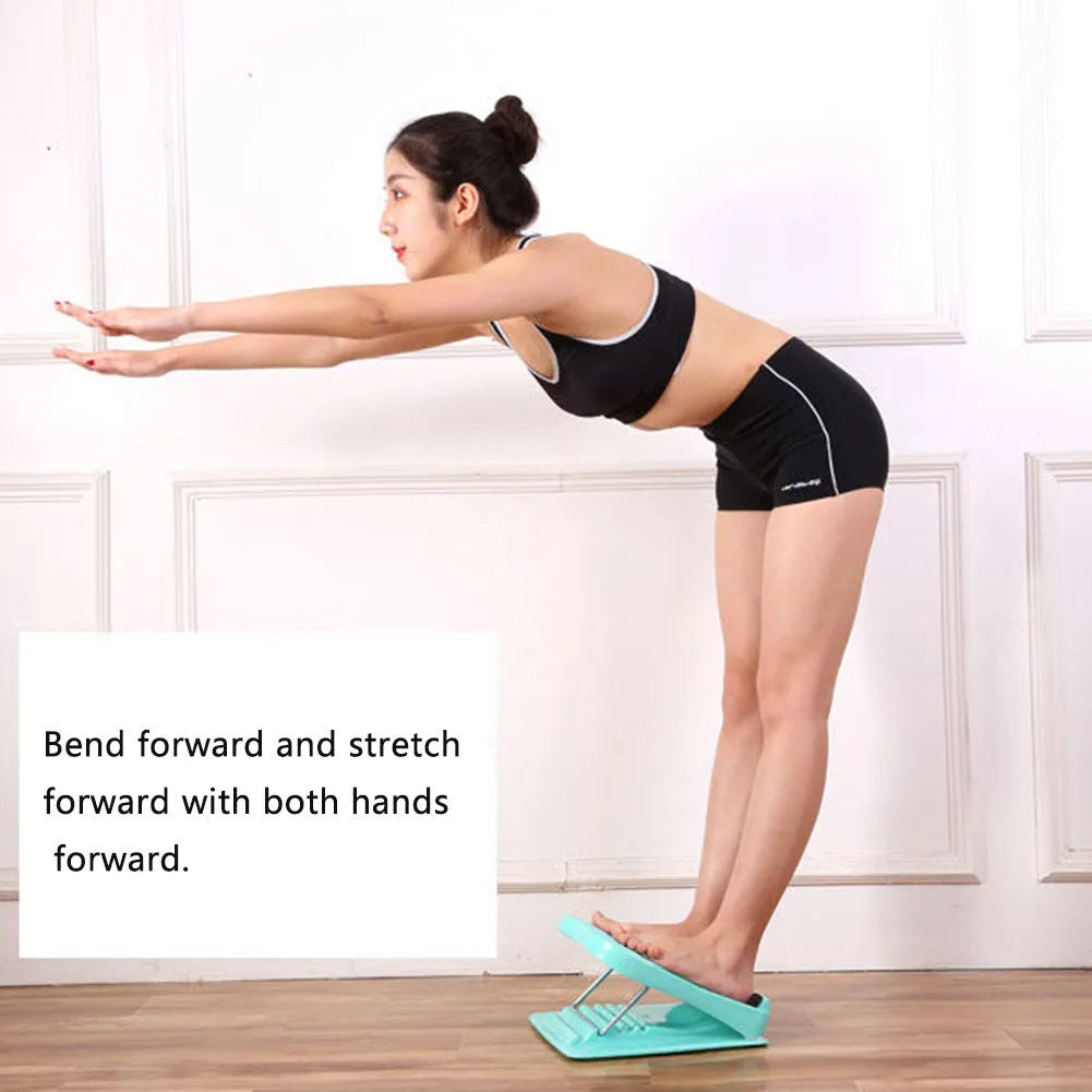 Portable black ABS calf stretching board with four adjustable incline positions on a textured surface