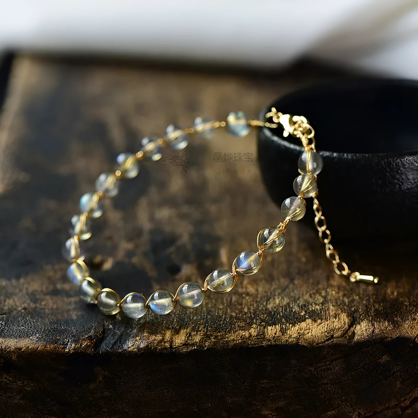 Blue moonstone bracelet with 6mm beads and 14K gilded metal setting