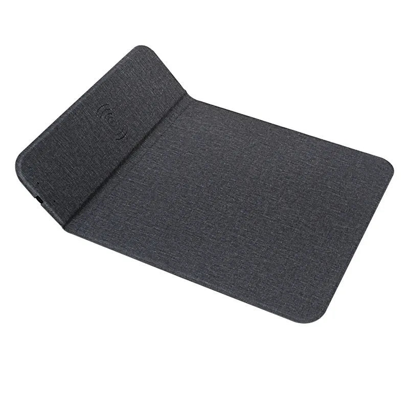 A foldable fabric phone holder with a phone attached, showing its adjustable angle and wireless charging capability.