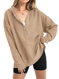 Women's loose solid colour pullover sweater with raglan sleeves in peacock green.