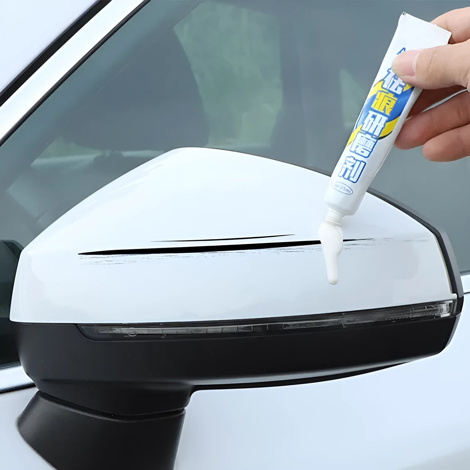 Automotive paint repair pen kit with scratch removal fluid and touch-up paint in universal colours
