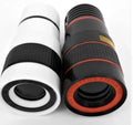 Black 12X phone telescope lens with mounting clip on a mobile phone