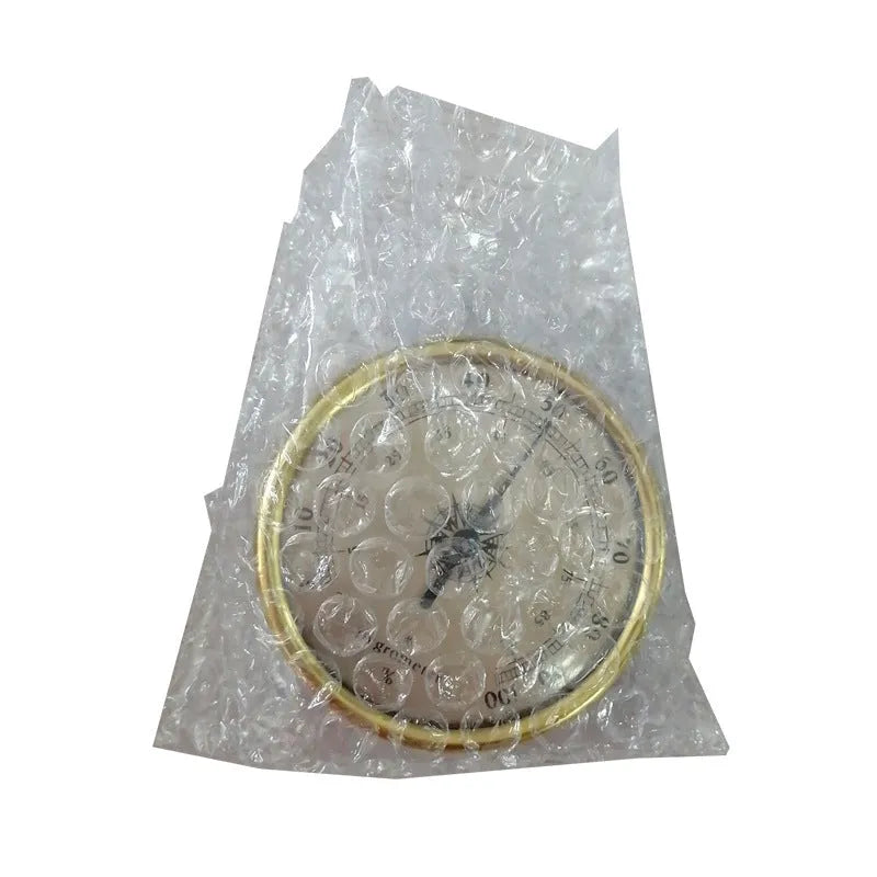 Analogue thermometer and hygrometer with aluminium ring and dial for home use