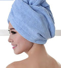 Women's microfiber hair dryer cap in assorted colours for absorbing wet hair.