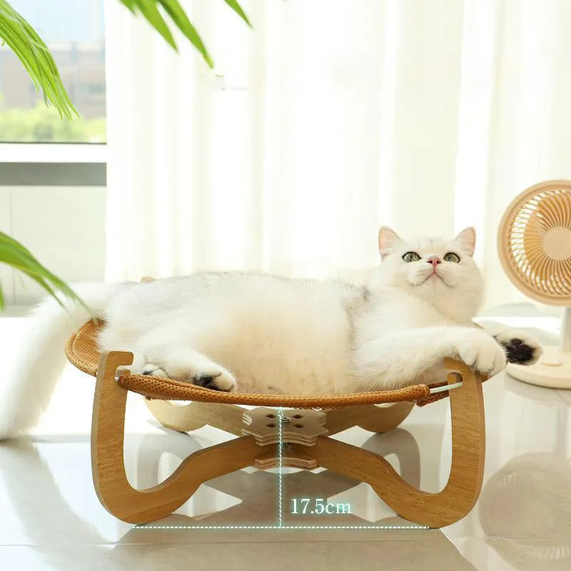Brown woven rattan pet hammock bed with a cool mat for cats and small dogs.
