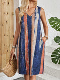 Sleeveless V-neck casual dress with colour block stripes on a mid-length silhouette.