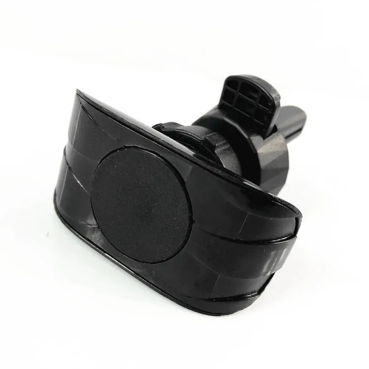 Black car phone holder attached to a car air vent, clamping a smartphone.