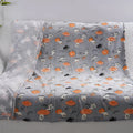 Cartoon-print flannel blanket shown in two sizes for child use or as an air conditioner cover.
